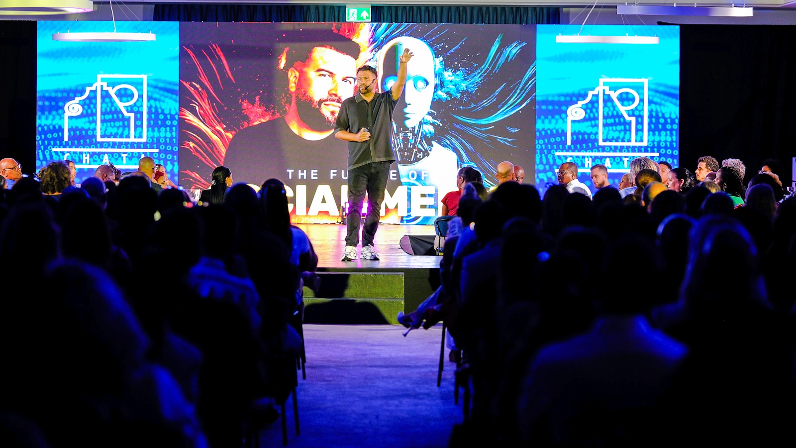 Presentation to an audience on a conference stage